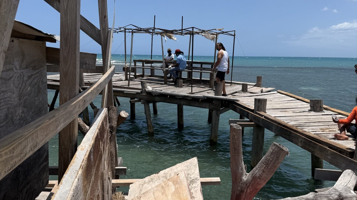 Floyd’s Pelican Bar, Jamaica: Everything You Need to Know Before You Go people lounge on a water bar