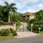 Villa Hibiscus with gated entrance and tropical garden